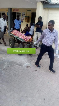 Body of the man being moved to the morgue