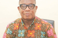 Dr Michael Tanu, Director-General of the GMet