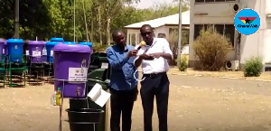 Health expert teaching how to properly wash hands