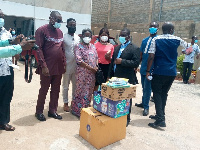 Some church members donating the items