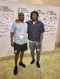 Sulley Muntari with Moses Armah Parker