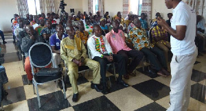 Isaac Gyesi, addressing the smallholder farmers