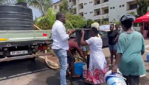 John Dumelo seen assisting students fetching water