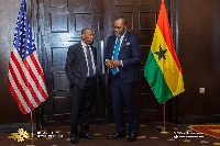 The Energy Minister (right) speaking to Sylvester Turner (left)