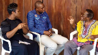 Kafui Dey and Baisiwa Dowuona Hammond speaking to Franklin Jantuah