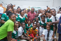 Former President John Mahama and some nurses