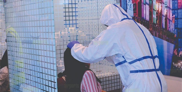 Some passengers at the Kotoko Airport undergoing coronavirus test