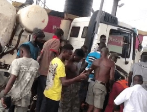 A tipper truck run over a tollbooth on the Tema Motorway