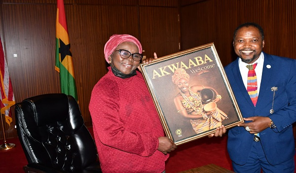 Ambassador Alima Mahama receiving the Akwaaba frame