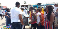 Some persons receiving the hot meal provided by government