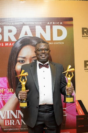 CEO of Cyberteq Falcon Limited, Mr. Ben Tagoe with the awards