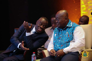 President  Akufo-Addo in a chat with the Business Development Minister, Dr Awal Mohammed