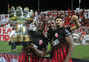 Asamoah Gyan with teammates