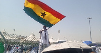 Ghanaian pilgrims strategically placed their national flag