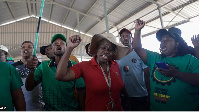 Miners demonstrate at the entrance of the Gold One mine