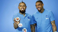 Kevin Prince and Barcelona teammate Arturo Vidal