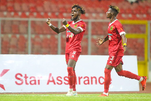 Asante Kotoko striker Steven Mukwala celebrating with Enoch Morison