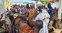 Enstooled queen mother (Front) greeting her elders