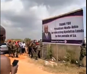 The mlitary pulled down a banner erected by the people