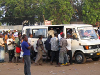 Some commuters boarding trotro