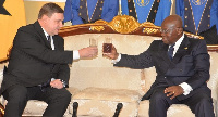 President Akufo-Addo proposing a toast to Jyrki Juhani, Finland Ambassador to Ghana