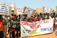 Some members of the Coalition of Textile Workers demonstrating on the streets of Accra