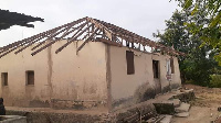 The roof of a house ripped by the storm