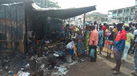 People gathered at the fire scene