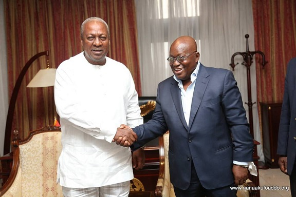 Former President John Dramani Mahama and President Akufo-Addo shaking hands