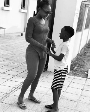 Actress Akuapem Poloo and son