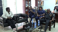 Director of Tema Port seated with Regional Police Commander