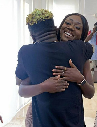 Hajia Bintu in an embrace with dancehall artiste, Shatta Wale