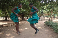 Two females playing ampe