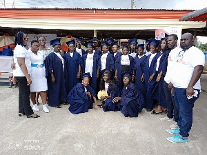 A group picture of the graduates and organizers of program