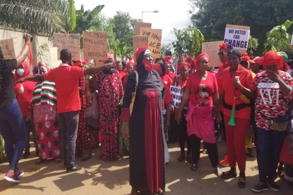 Some of the female protestors clad in black and red apparel