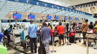 File Photo: Travelers checking in at the airport