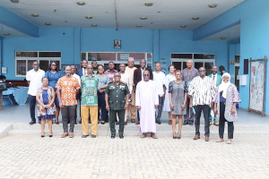 Major General Francis Ofori, the Commandant, KAIPTC (fourth left) with KAIPTC PhD students