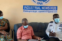 Tema Regional MTTD Chief Supt William Asante (right) speaks during a meeting at GNA offices