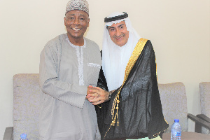 Alhaji Boniface In A Hand Shake With The Leader Of The Saudi Delegation