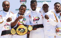 Wasiru 'Gyatabi' Mohammed holding his title