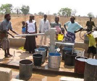 A group of women at a borehole