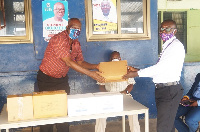 The presentation was made by the Regional Branch Manager(left) to Mr. George Senkyere(right)