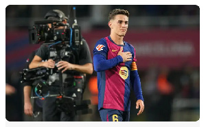 Gavi of FC Barcelona acknowledges the fans at full-time following the team's victory in the La Liga