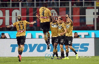 Nicholas Opoku joins his teammates in celebrating the goal