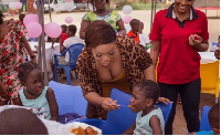 Moesha Boduong cuts her birthday cake with the kids