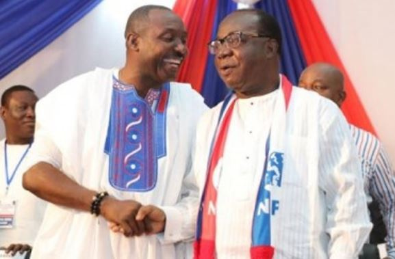 Acting national chairman for the NPP, Freddie Blay in a handshake with General secretary John Boadu