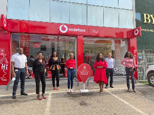 Group photograph of Vodafone staff at the launch of the new shop