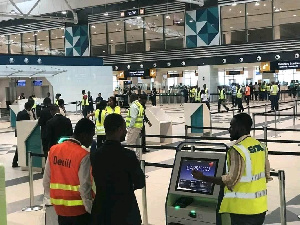 Travellers and workers at the Terminal 3 of Kotoka International Airport