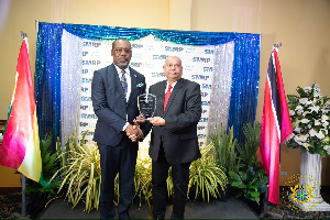 Dr. Matthew Opoku Prempeh receiving his award