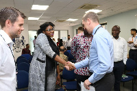 Mr Ian Walker (right) presenting the award to Madam Cordie Aziz